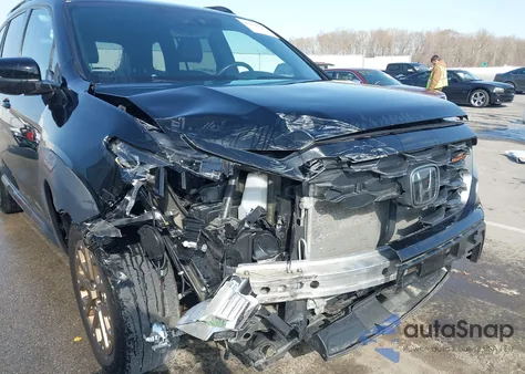 2022 Honda Passport Awd Trailsport z USA, uszkodzony, nr VIN 5FNYF8H63NB015562